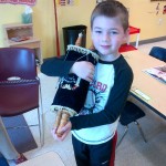 Noah Huneycutt holding Little Torah